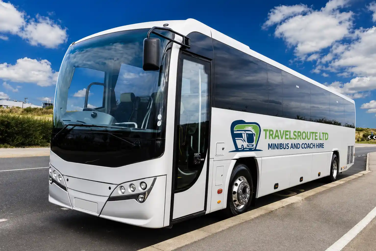 White coach on a motorway near Wakefield, heading for the M1 and M62 interchange